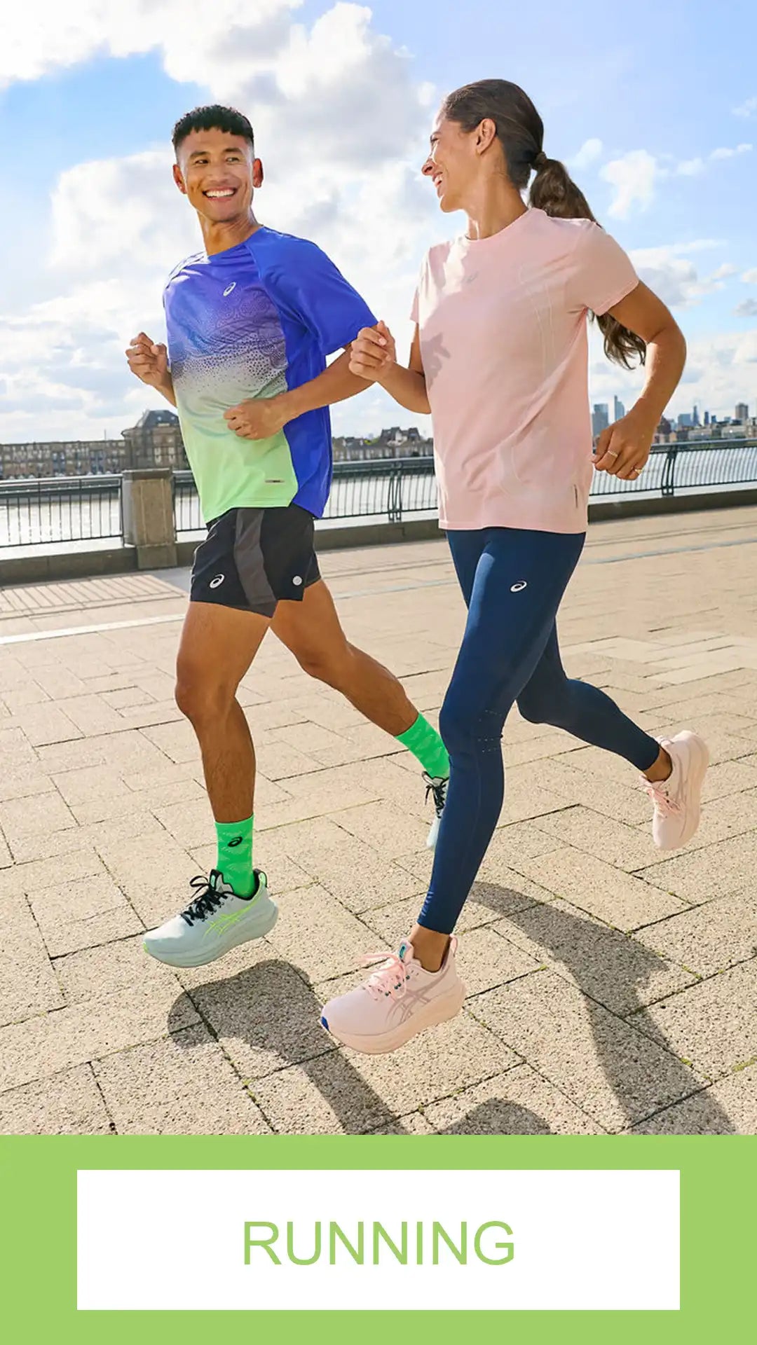 Two people running outdoors with a cityscape in the background